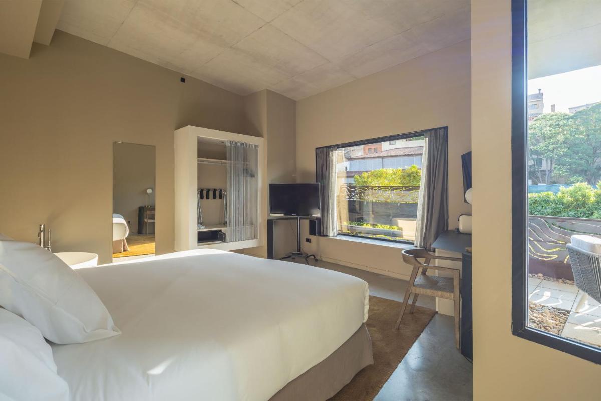 Cama o camas de una habitación en Hotel Viura