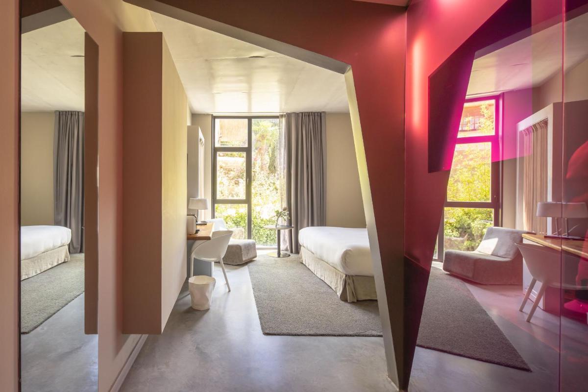 Cama o camas de una habitación en Hotel Viura
