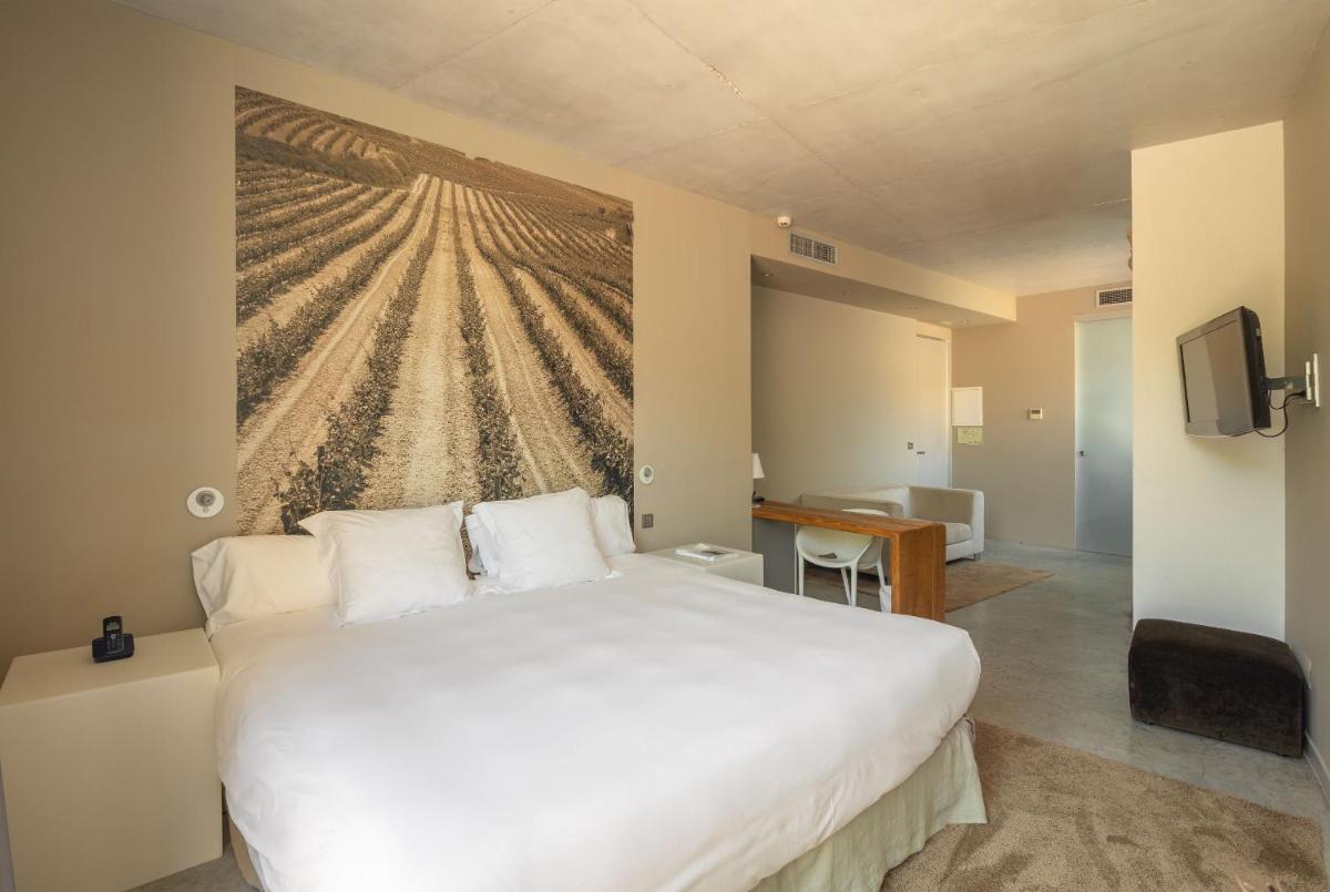 Cama o camas de una habitación en Hotel Viura