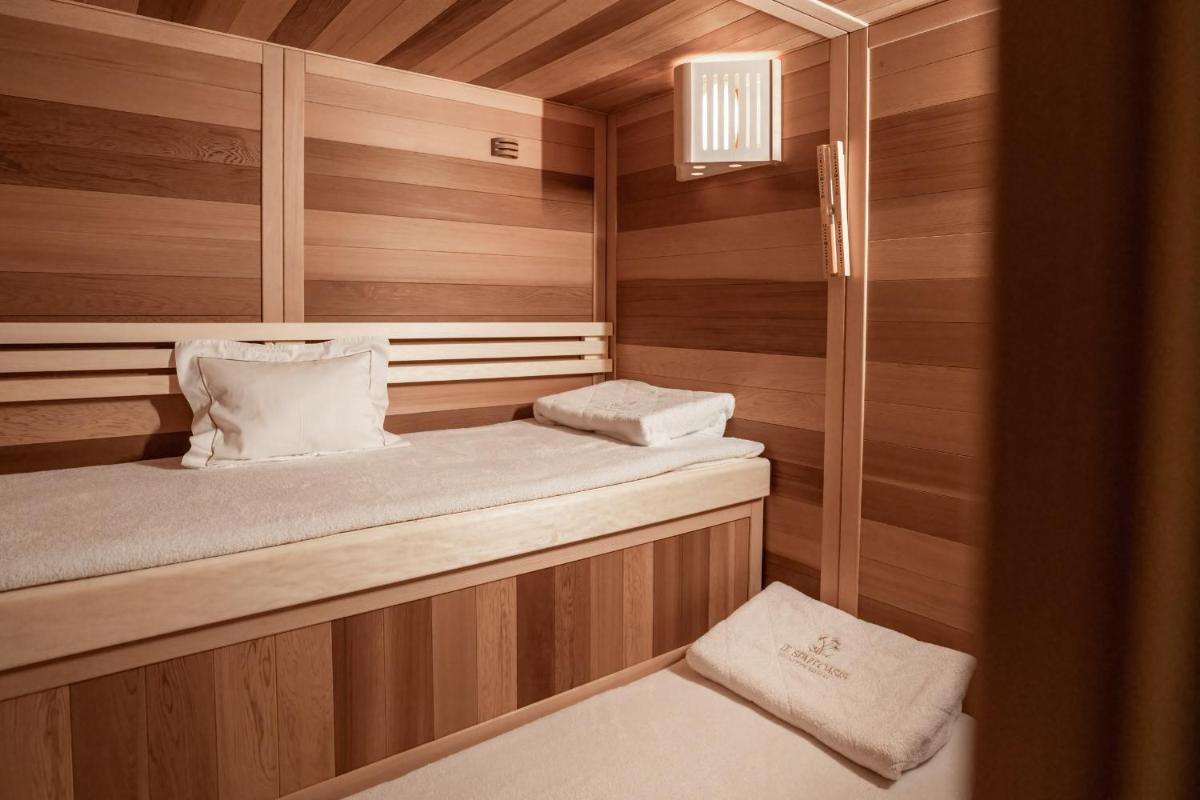 Un ou plusieurs lits dans un hébergement de l'établissement Ermitage de l'Oasis & Spa - Cannes Mandelieu