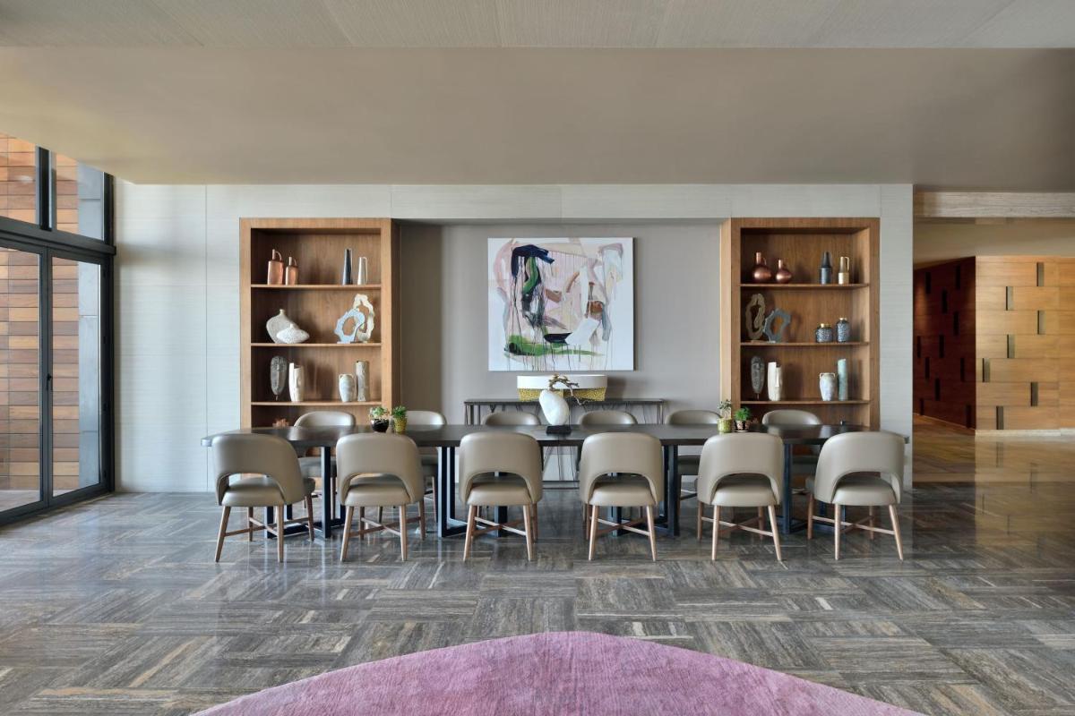 a large dining room with a table and chairs at The Westin Resort & Spa Himalayas in Rishīkesh