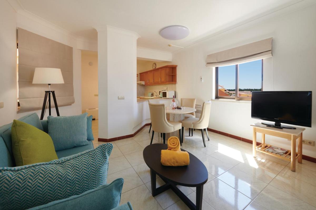 Uma televisão e/ou sistema de entretenimento em Four Seasons Vilamoura
