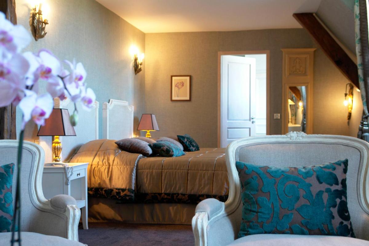 Coin salon dans l'établissement Chateau De Fere