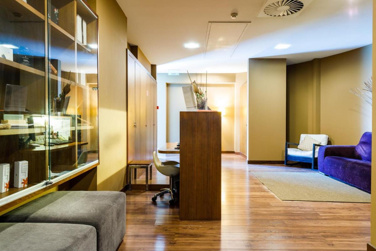 Uma área de estar em Axis Porto Business & Spa Hotel
