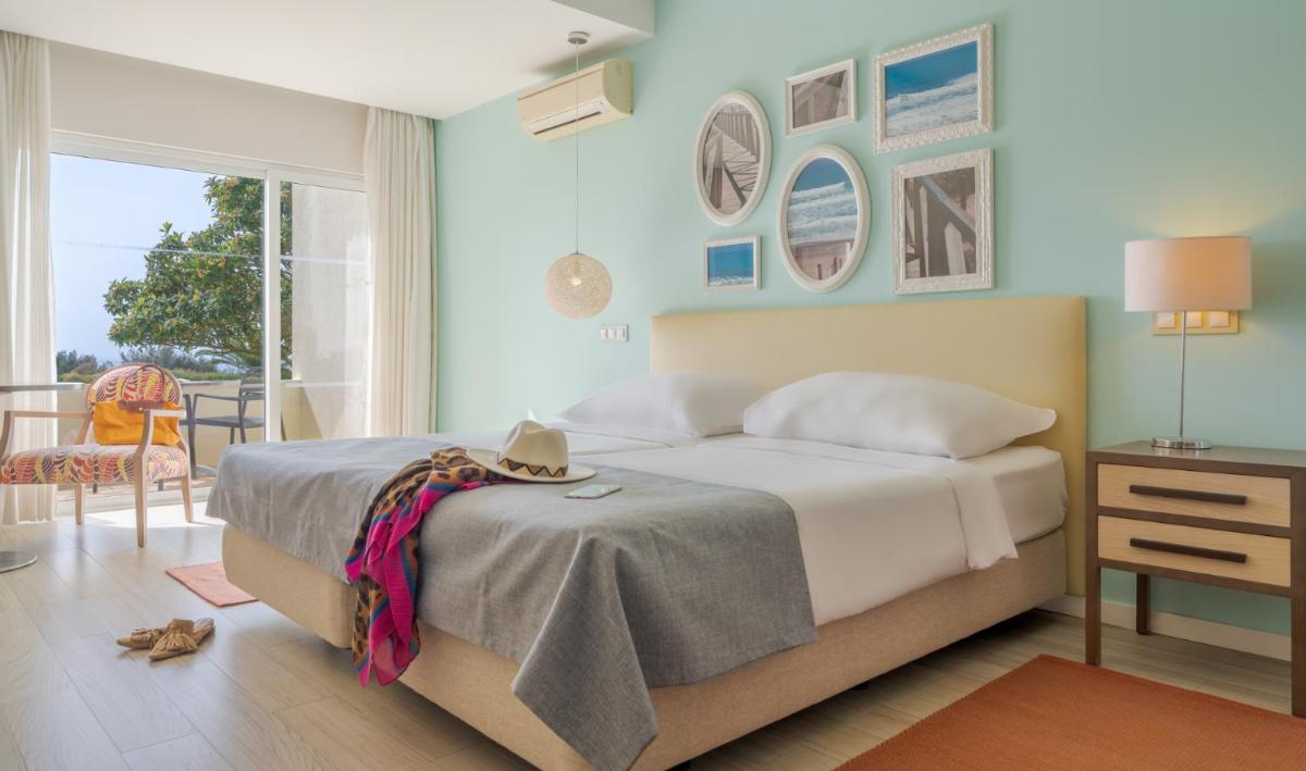 Uma cama ou camas num quarto em Pestana Alvor Praia Premium Beach & Golf Resort