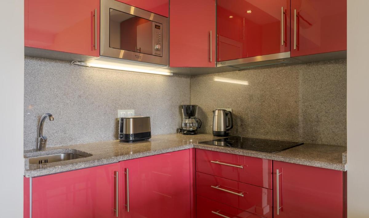 A cozinha ou kitchenette de Pestana Alvor Praia Premium Beach & Golf Resort