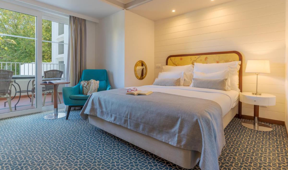 Uma cama ou camas num quarto em Pestana Alvor Praia Premium Beach & Golf Resort