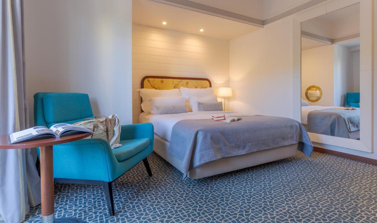 Uma cama ou camas num quarto em Pestana Alvor Praia Premium Beach & Golf Resort