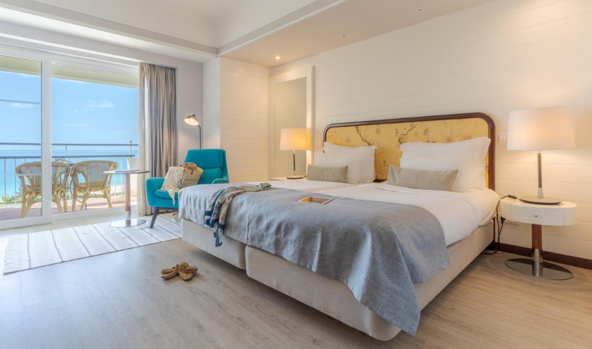 Uma cama ou camas num quarto em Pestana Alvor Praia Premium Beach & Golf Resort
