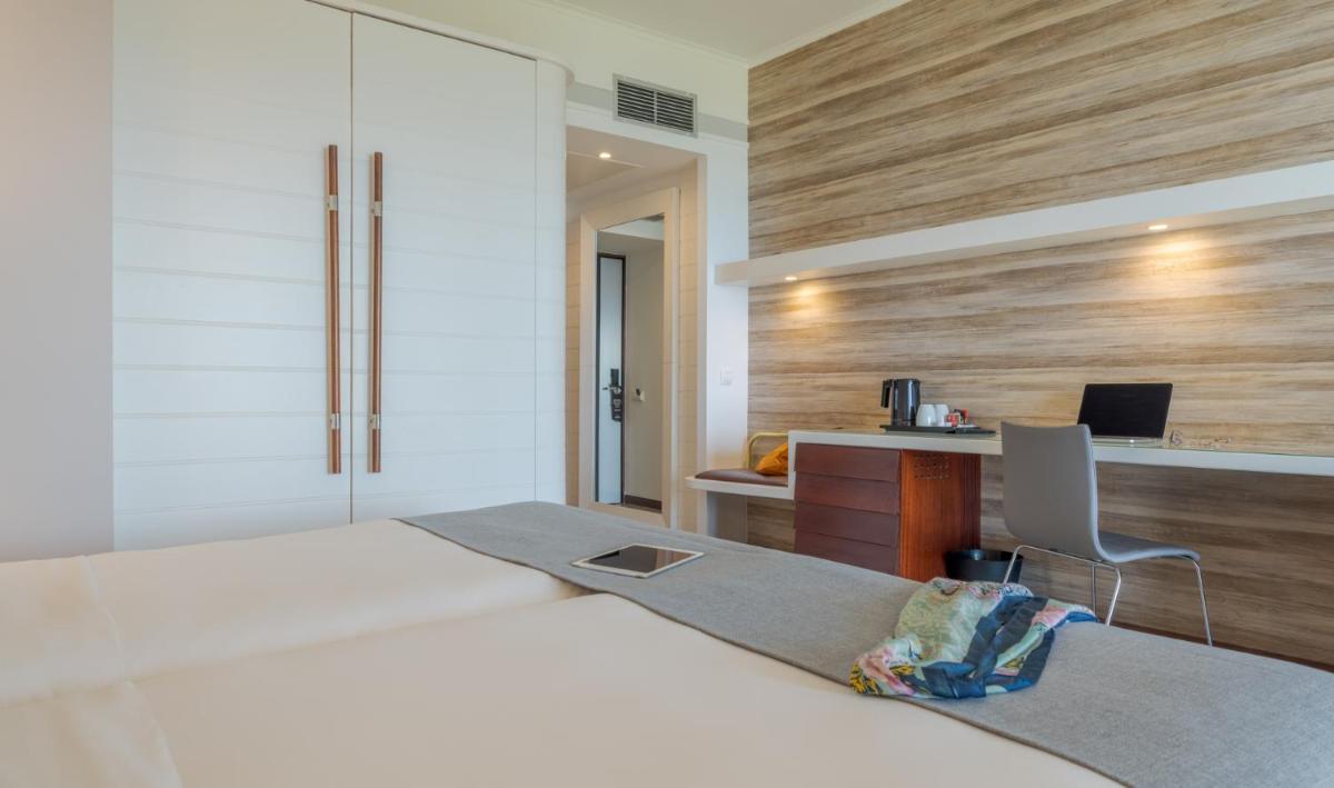 Uma cama ou camas num quarto em Pestana Alvor Praia Premium Beach & Golf Resort