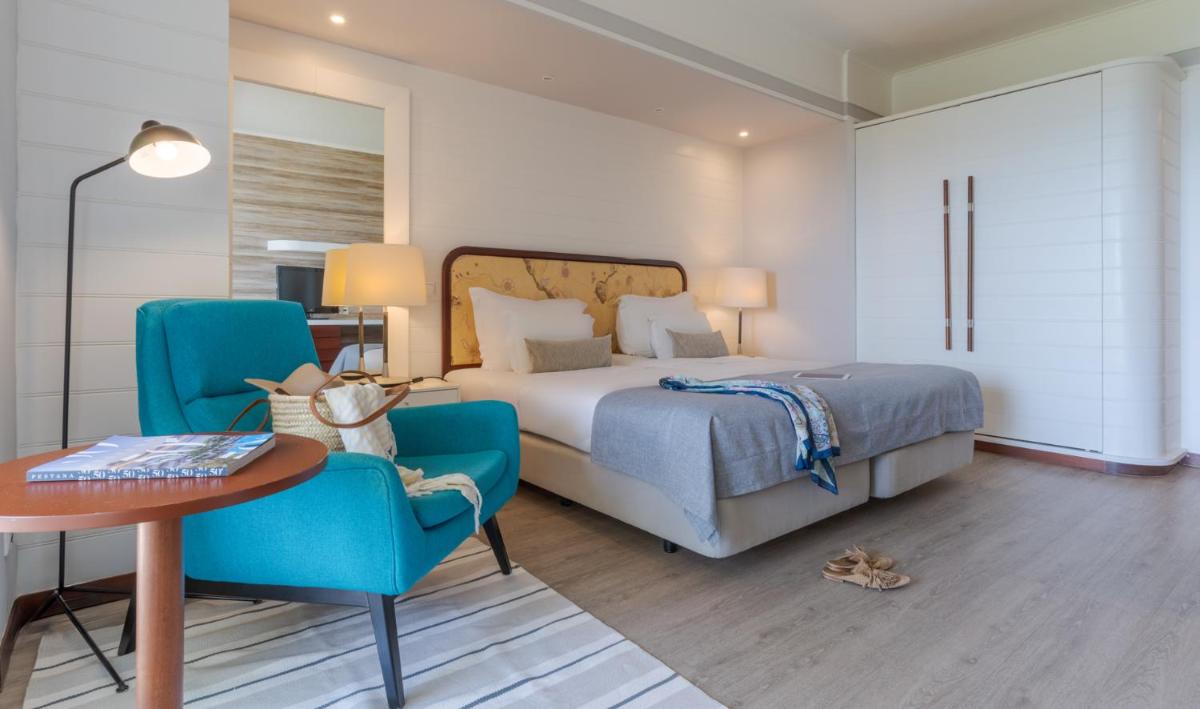 Uma cama ou camas num quarto em Pestana Alvor Praia Premium Beach & Golf Resort