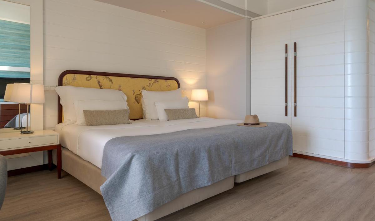 Uma cama ou camas num quarto em Pestana Alvor Praia Premium Beach & Golf Resort