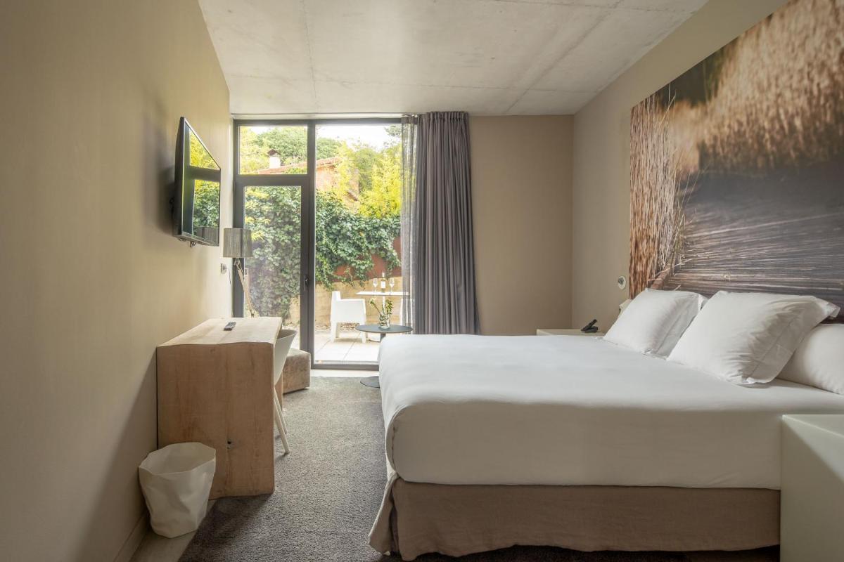 Cama o camas de una habitación en Hotel Viura