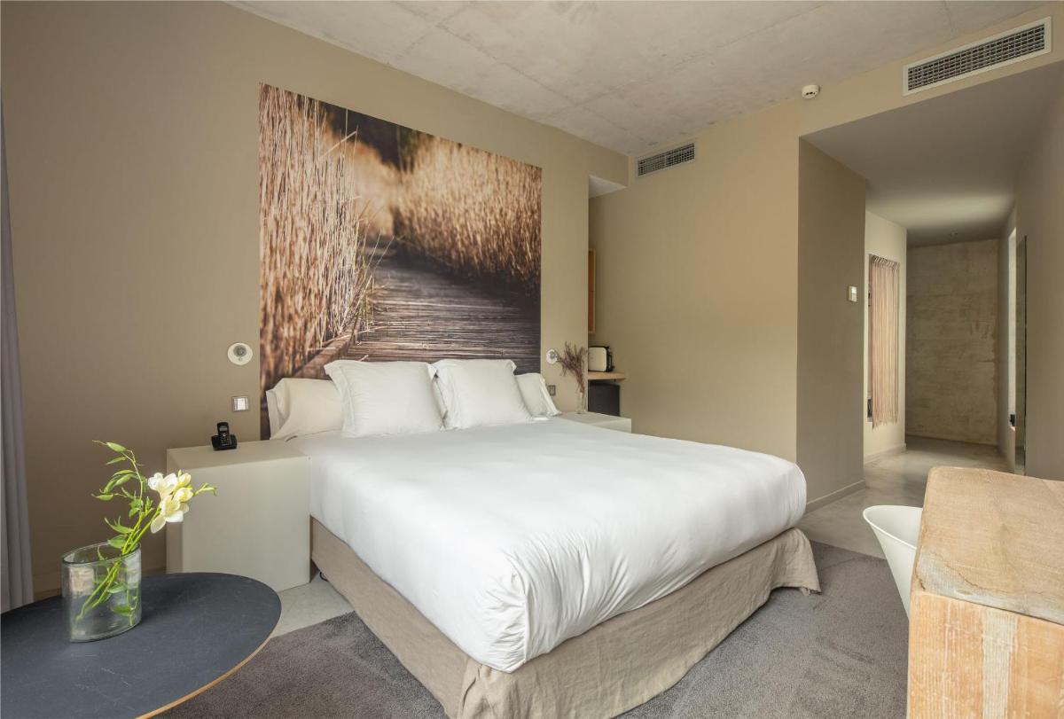Cama o camas de una habitación en Hotel Viura