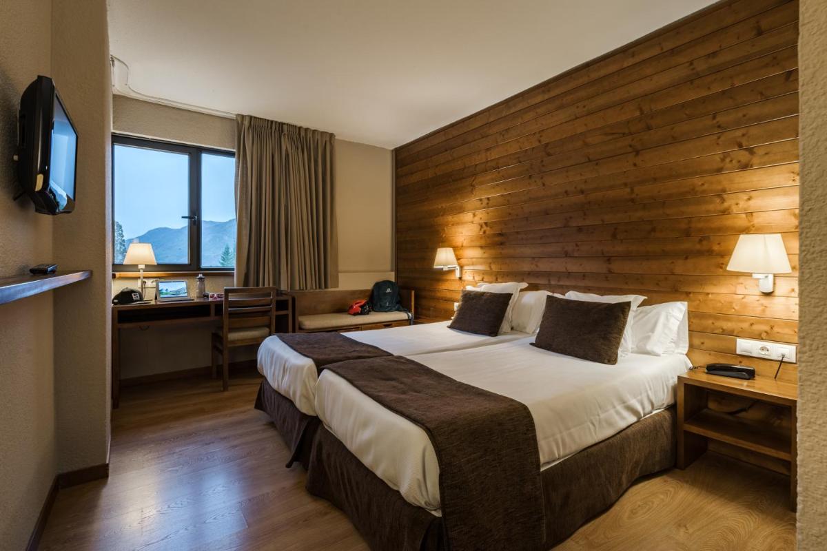 Cama o camas de una habitación en Tuc Blanc