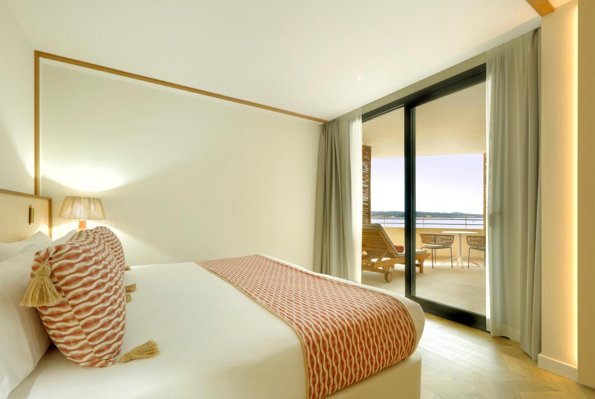 Cama o camas de una habitación en TRS Ibiza Hotel - Adults Only