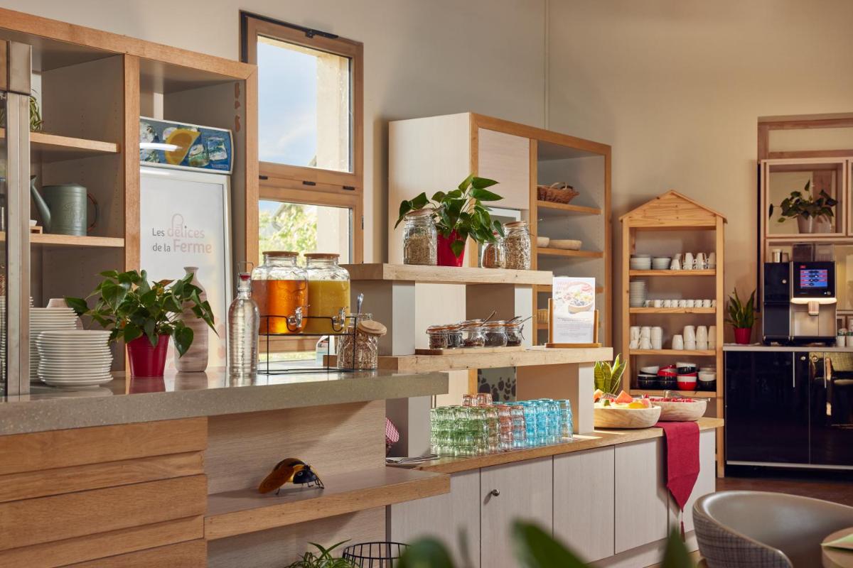 Una cocina o zona de cocina en Center Parcs Villages Nature Paris