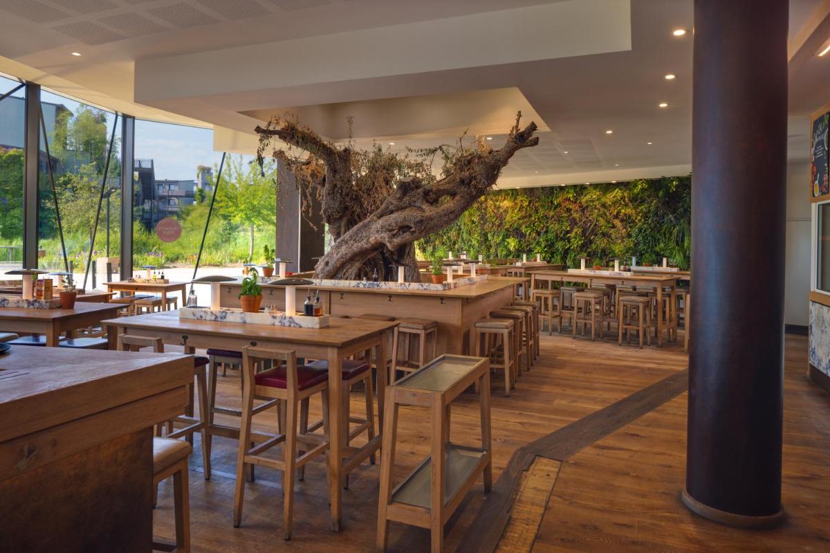 Un restaurante o sitio para comer en Center Parcs Villages Nature Paris