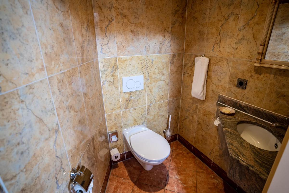Ein Badezimmer in der Unterkunft Hotel Strandperle