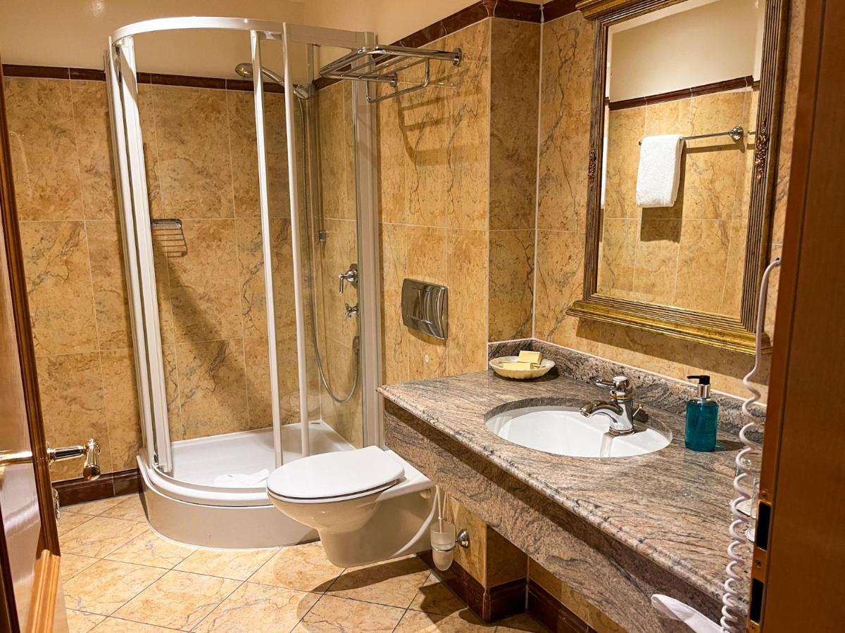Ein Badezimmer in der Unterkunft Hotel Strandperle