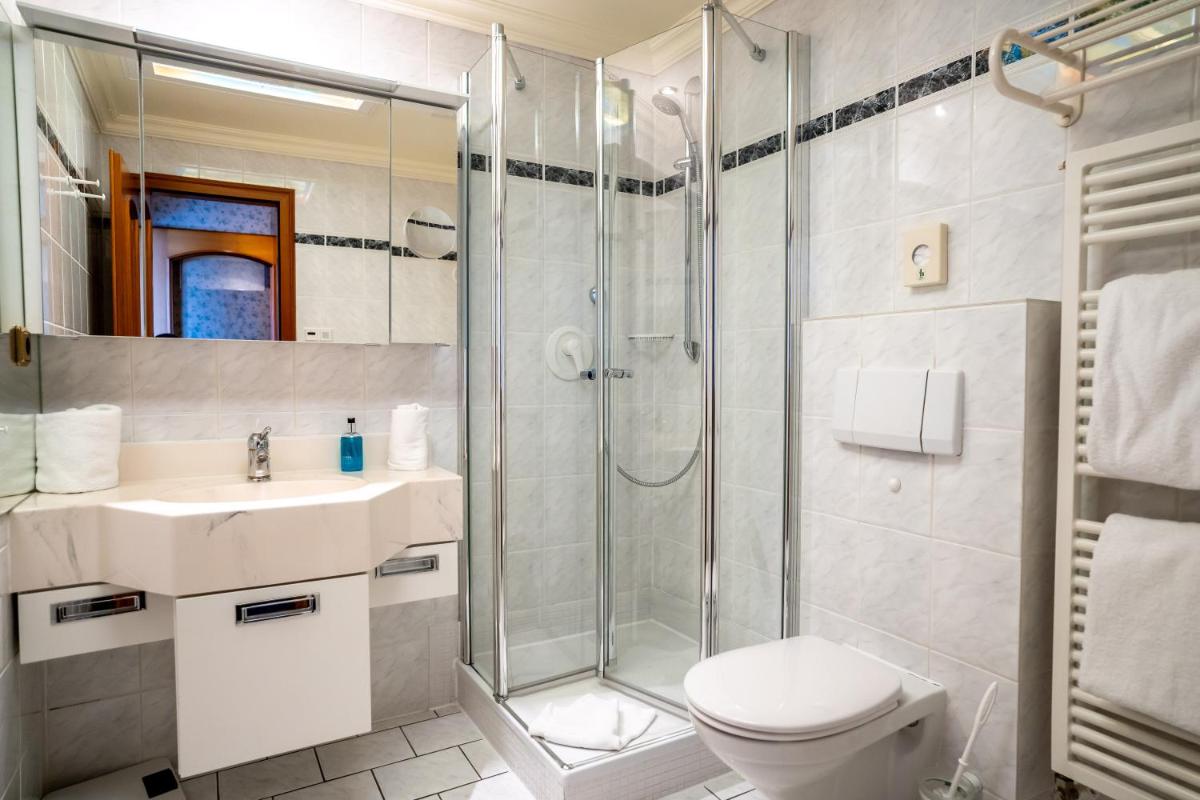 Ein Badezimmer in der Unterkunft Hotel Strandperle