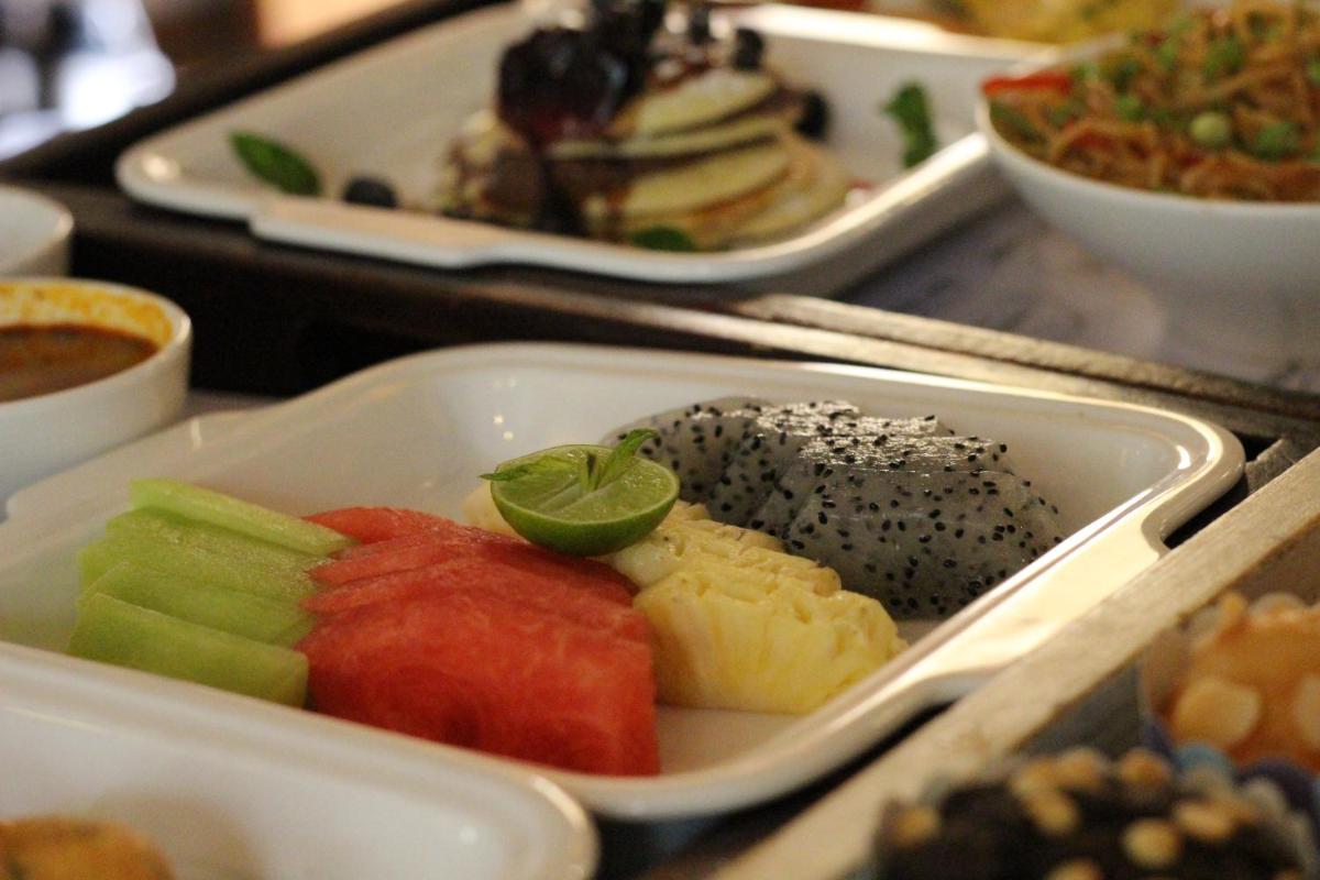 a tray of food with different types of sushi at Le Meridien Jaipur Resort & Spa in Jaipur