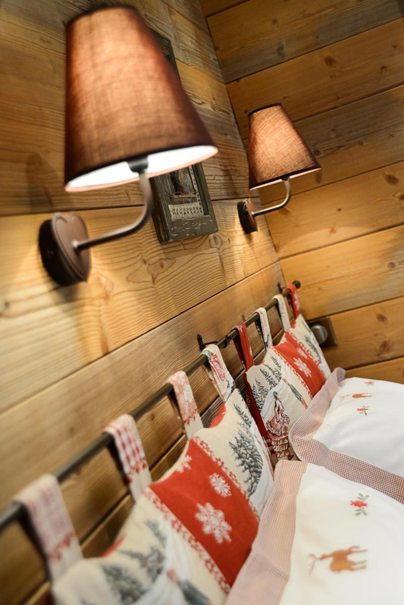 Un ou plusieurs lits dans un hébergement de l'établissement Café-Hôtel Le Morillon, Domaine du Grand Massif-Samoëns