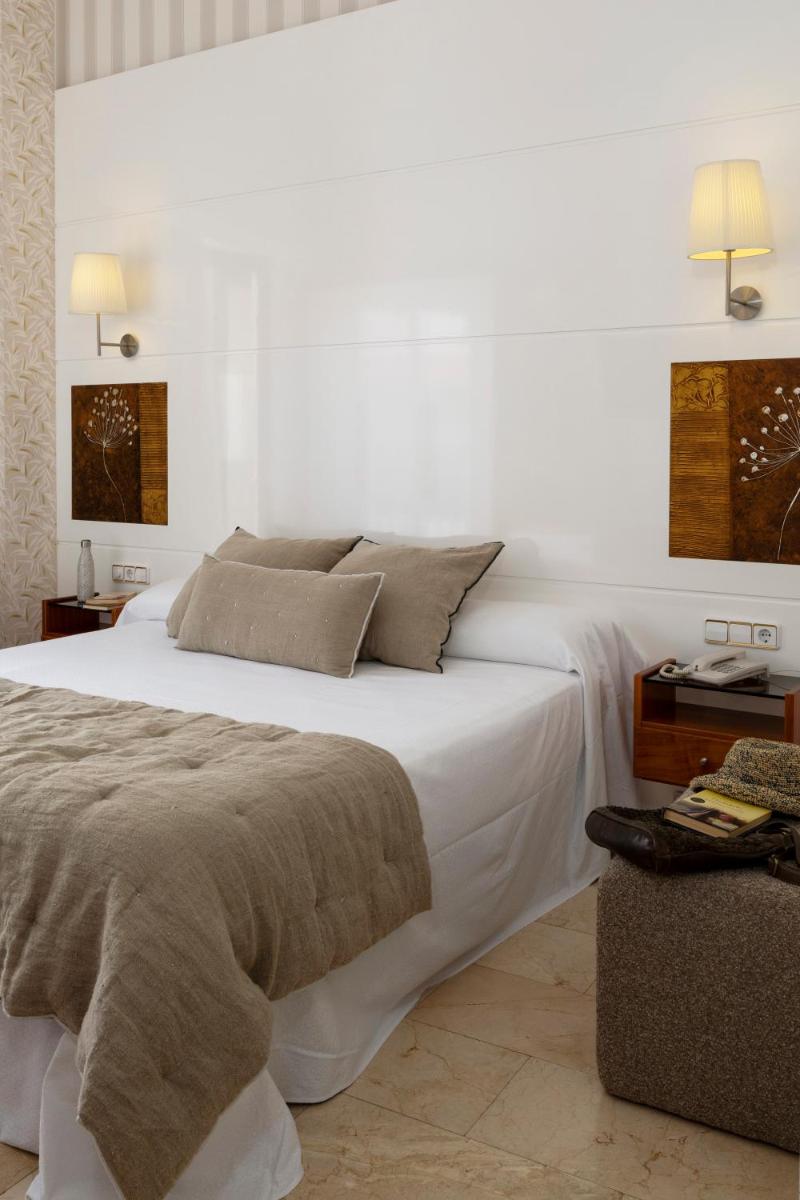 Cama o camas de una habitación en Hotel Spa Porto Cristo