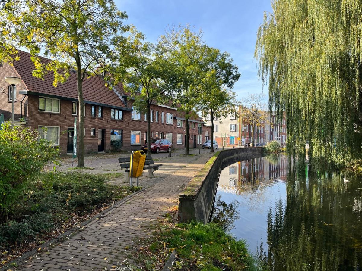 Bijzonder stadshuis met diepe moderne tuin. - Housity