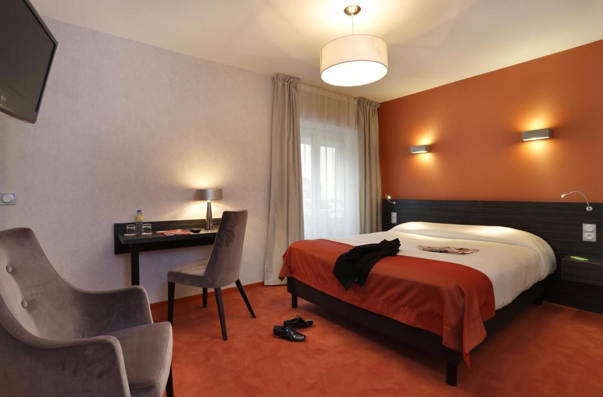 Un ou plusieurs lits dans un hébergement de l'établissement The Originals City, Hôtel Les Thermes de l'Avenue, Dax