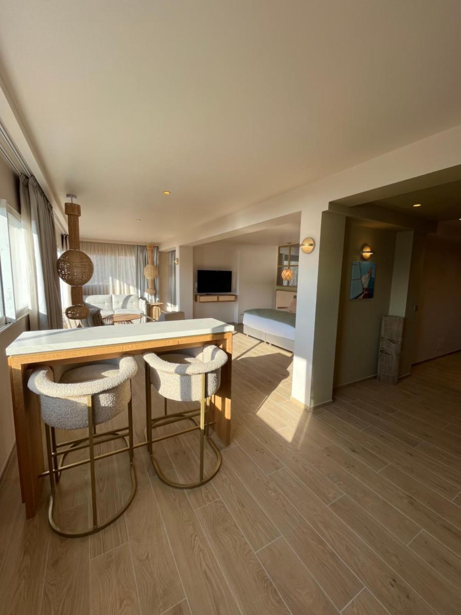 Télévision ou salle de divertissement dans l'établissement Hotel Riva Beach