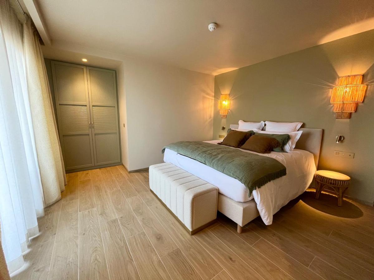 Un ou plusieurs lits dans un hébergement de l'établissement Hotel Riva Beach