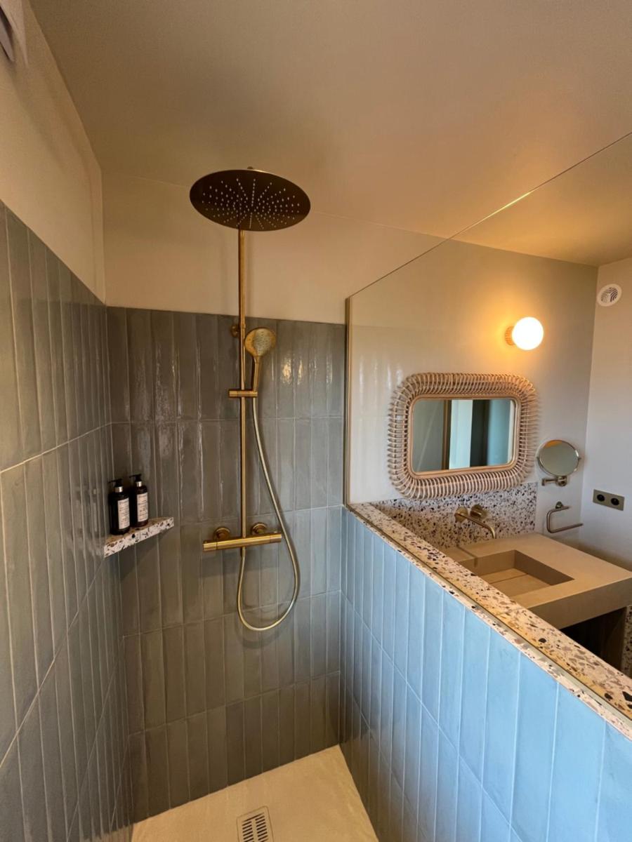 Salle de bains dans l'établissement Hotel Riva Beach