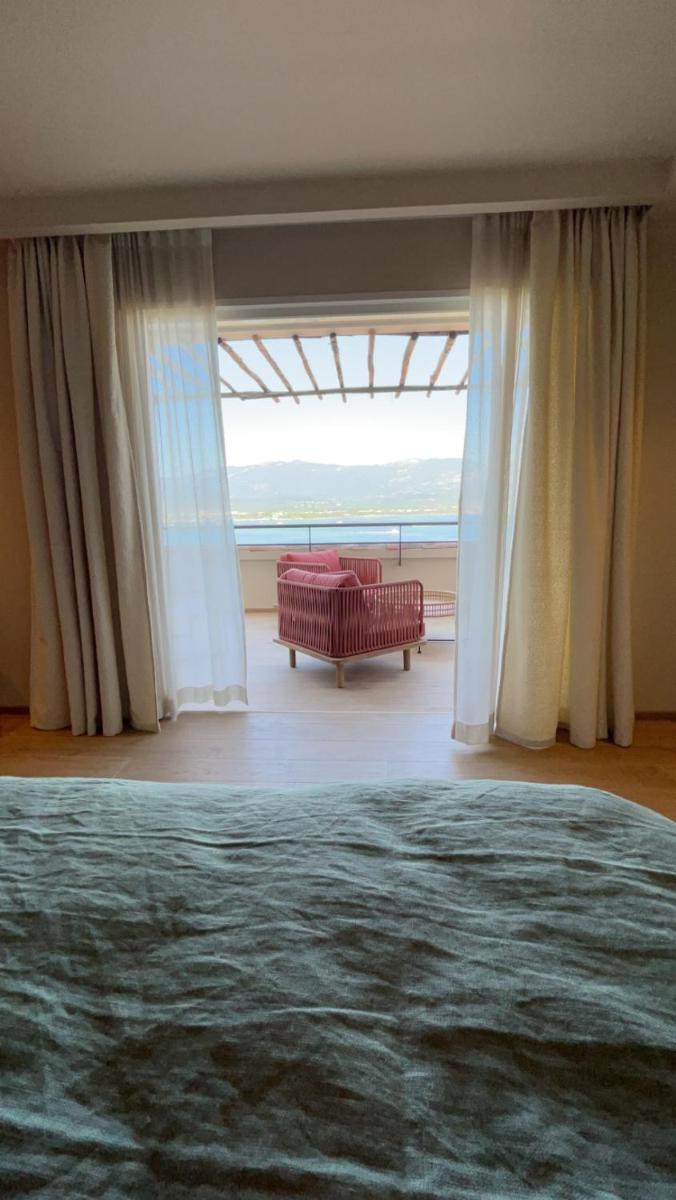 Un ou plusieurs lits dans un hébergement de l'établissement Hotel Riva Beach