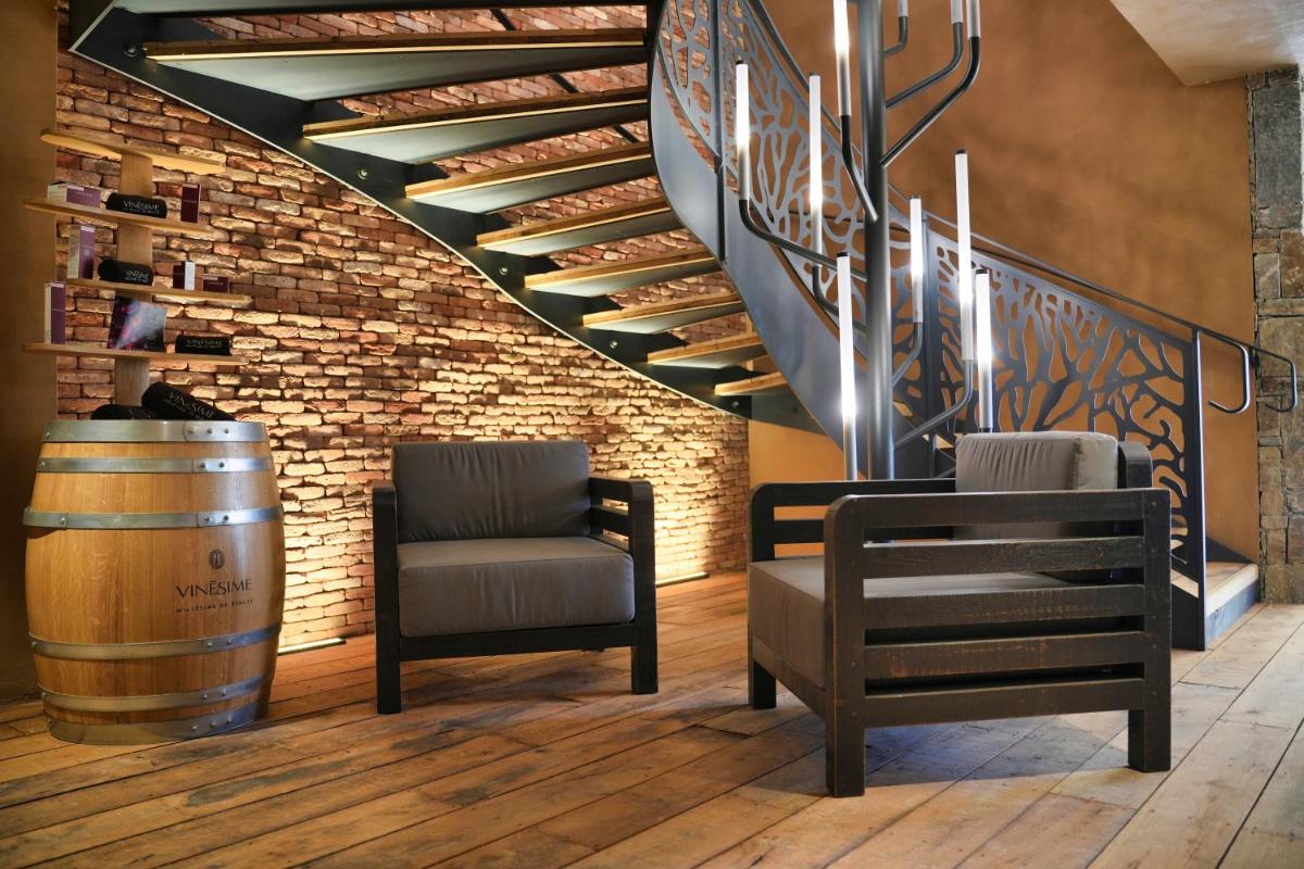 Coin salon dans l'établissement Les Regalia Hôtel & Spa