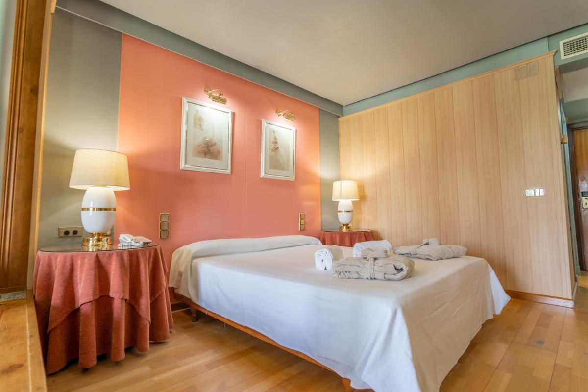 Cama o camas de una habitación en Hotel Balneario de Chiclana