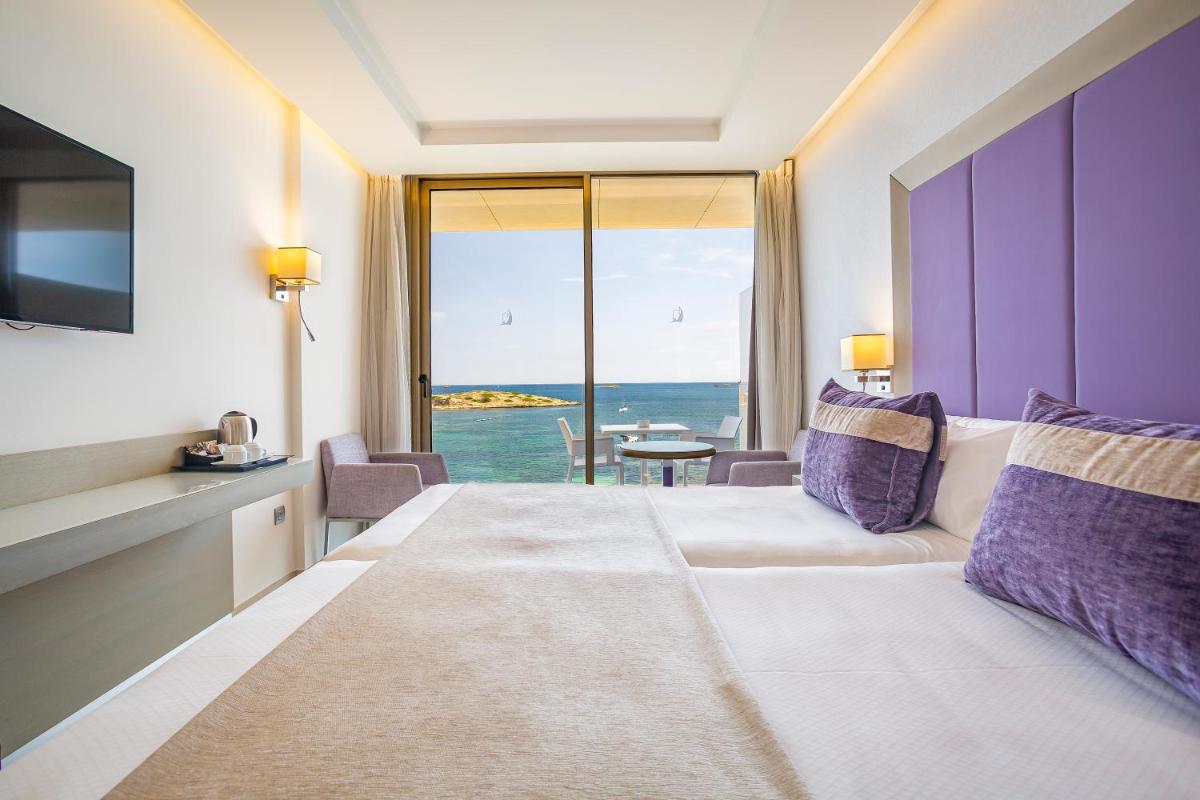 Cama o camas de una habitación en Hotel Torre del Mar - Ibiza