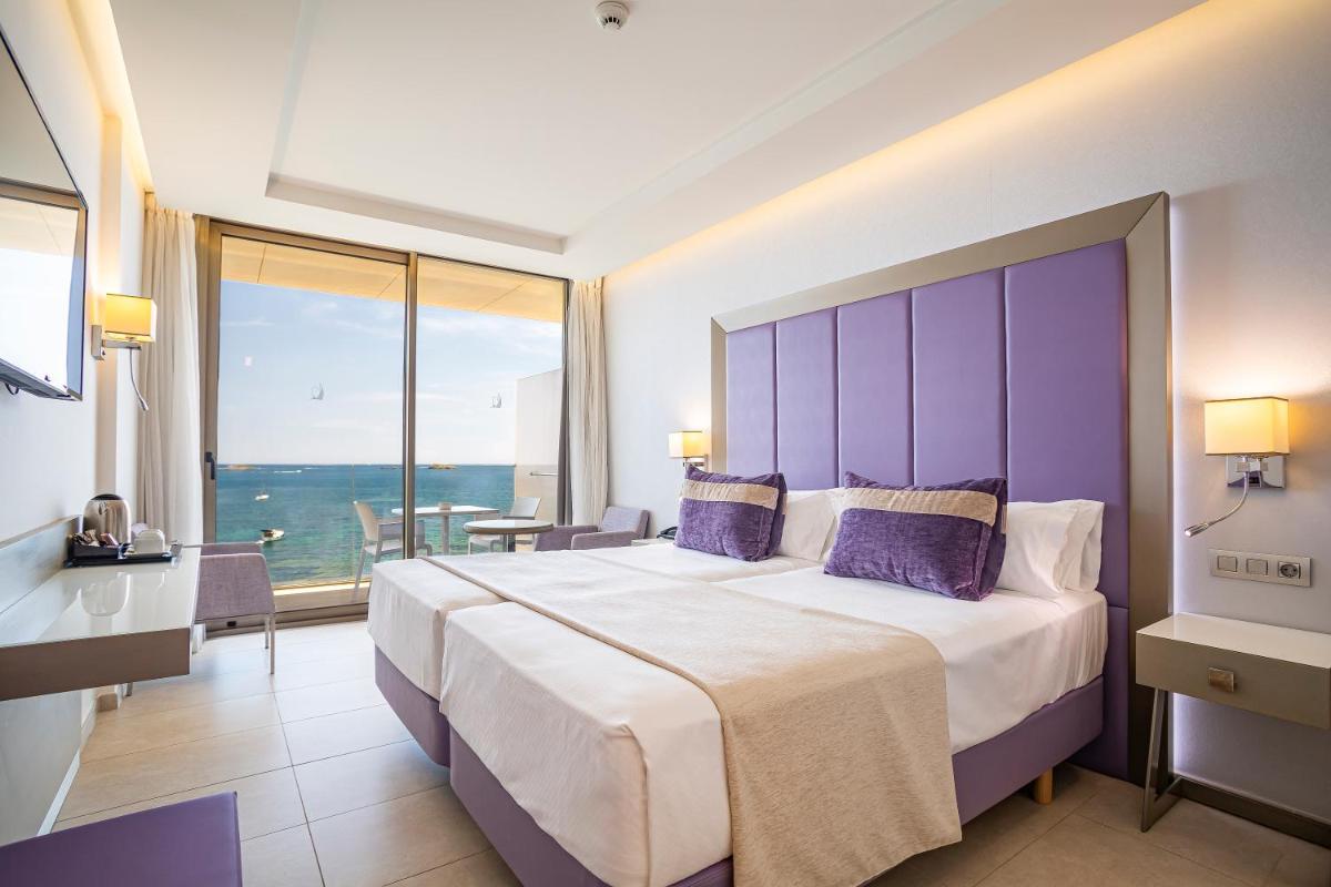 Cama o camas de una habitación en Hotel Torre del Mar - Ibiza