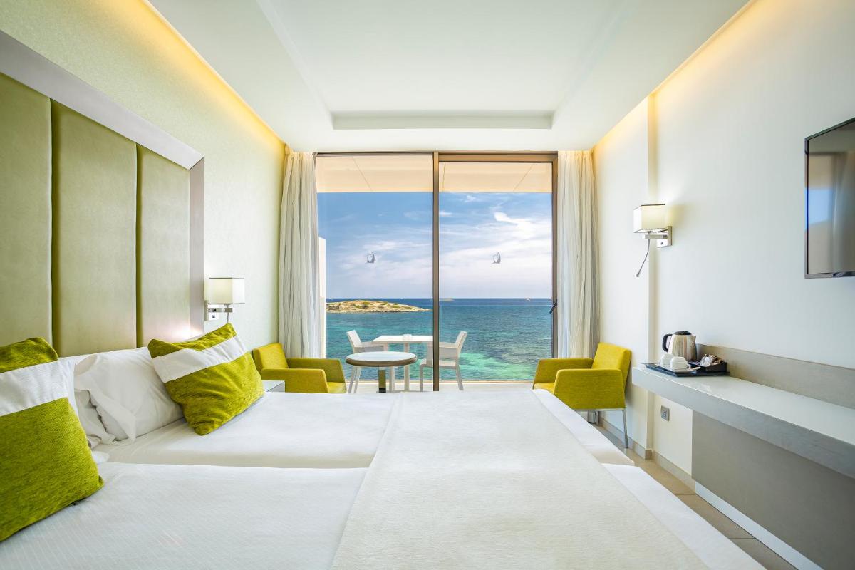 Cama o camas de una habitación en Hotel Torre del Mar - Ibiza