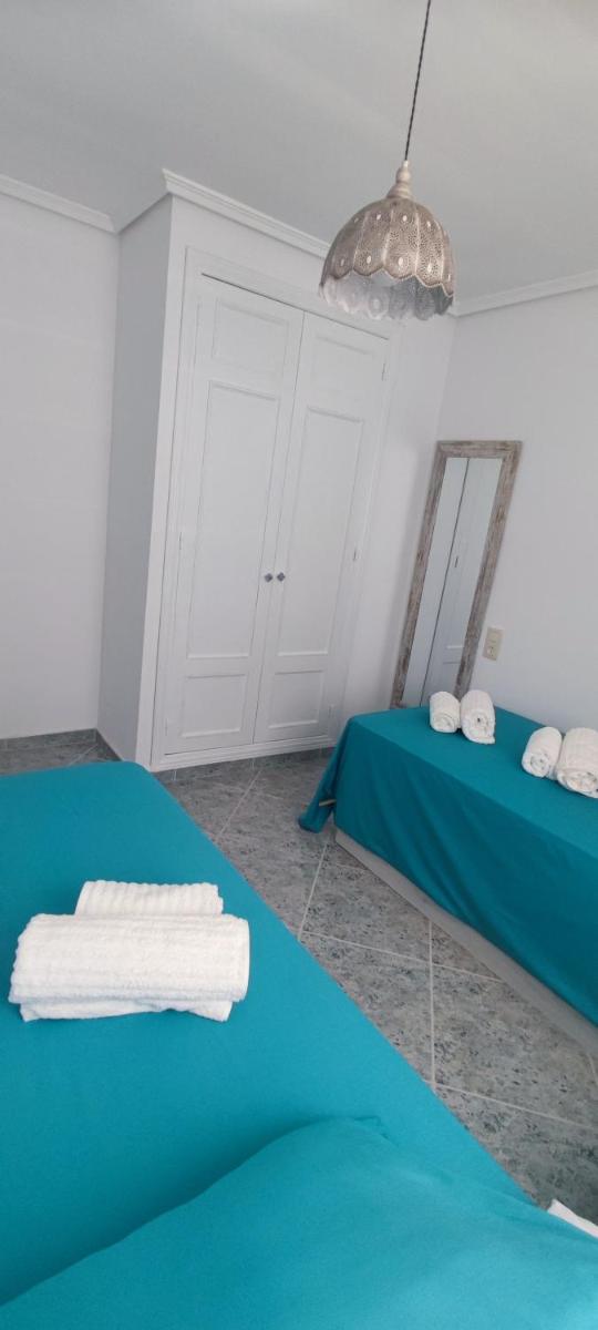 Acogedor apartamento en Daimús a 150 metros de la playa con parking privado y piscinas comunitarias - Housity