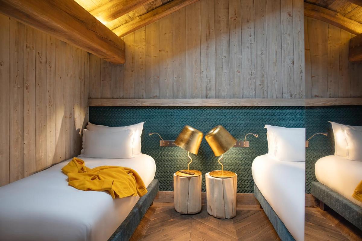 Un ou plusieurs lits dans un hébergement de l'établissement Armancette - The Leading Hotels of the World