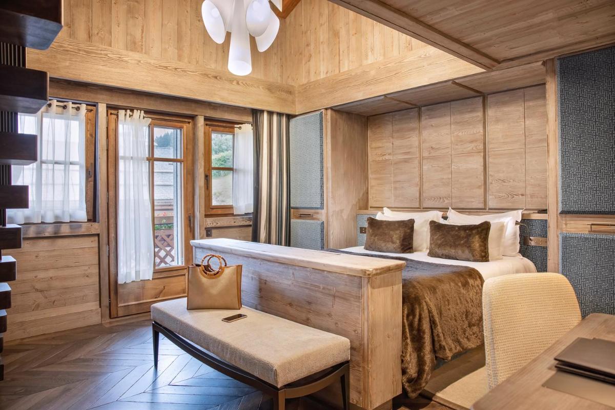 Un ou plusieurs lits dans un hébergement de l'établissement Armancette - The Leading Hotels of the World