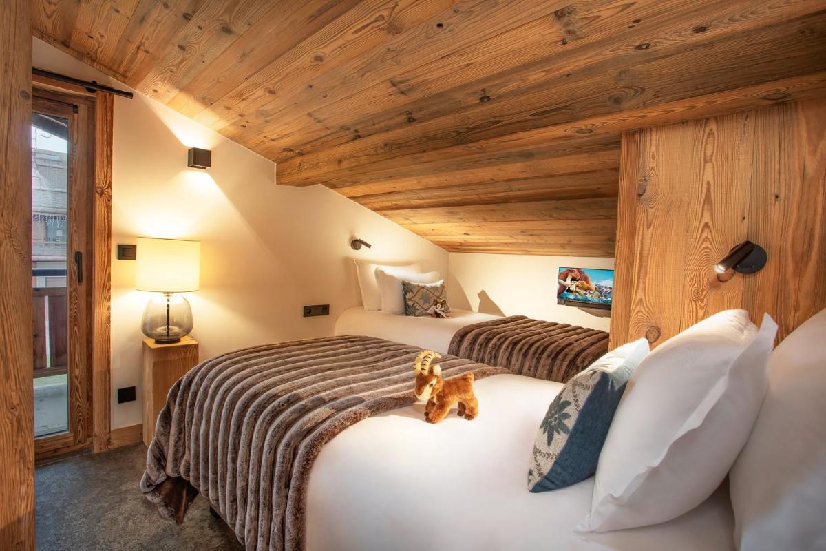 Un ou plusieurs lits dans un hébergement de l'établissement Armancette - The Leading Hotels of the World
