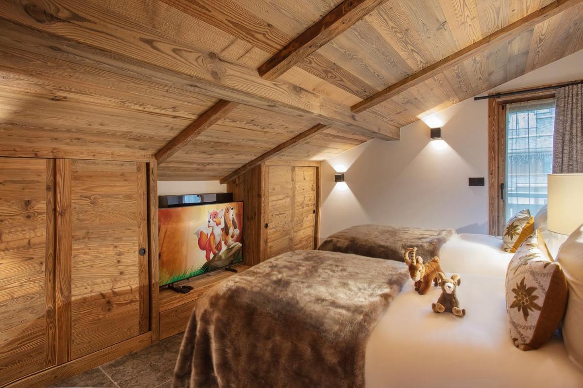 Un ou plusieurs lits dans un hébergement de l'établissement Armancette - The Leading Hotels of the World