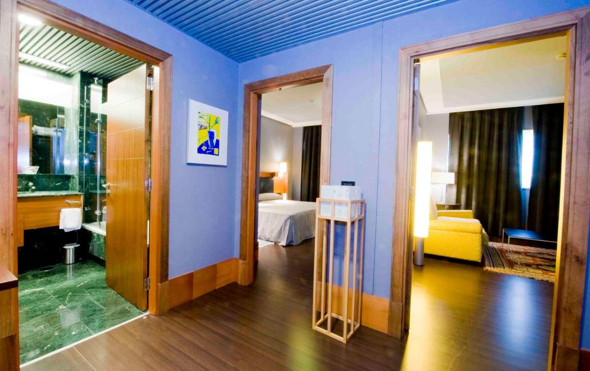 Cama o camas de una habitación en Gran Hotel Lakua