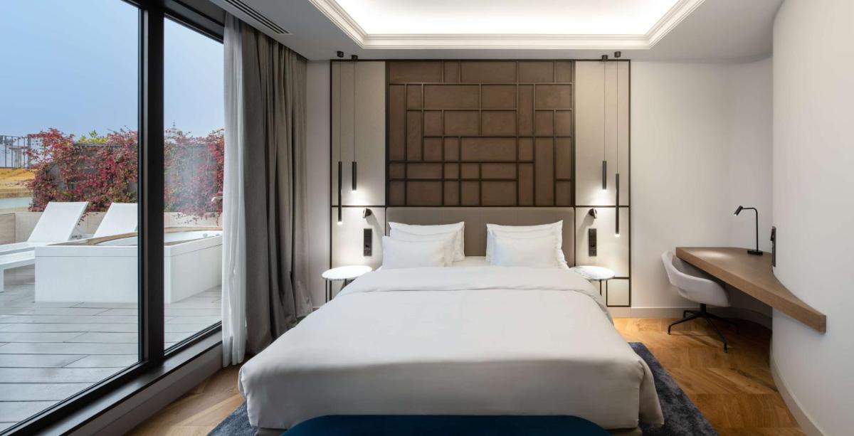Cama o camas de una habitación en Radisson Collection Hotel, Magdalena Plaza Sevilla