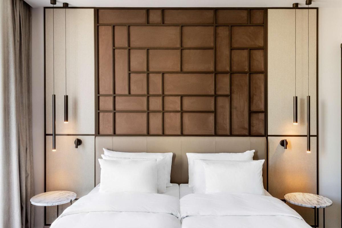 Cama o camas de una habitación en Radisson Collection Hotel, Magdalena Plaza Sevilla