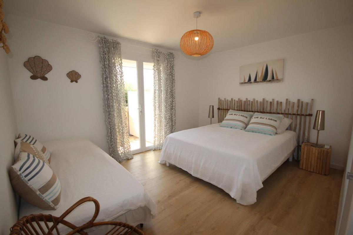FACE à la Mer, Superbe appartement climatisé au RDC d'une maison, classé 4 étoiles, 5 couchages -WIFI-PORTIRAGNES PLAGE LXBFM32 - Housity