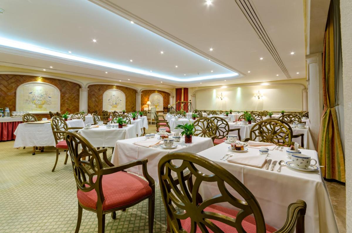 Um restaurante ou outro lugar para comer em Olissippo Lapa Palace – The Leading Hotels of the World