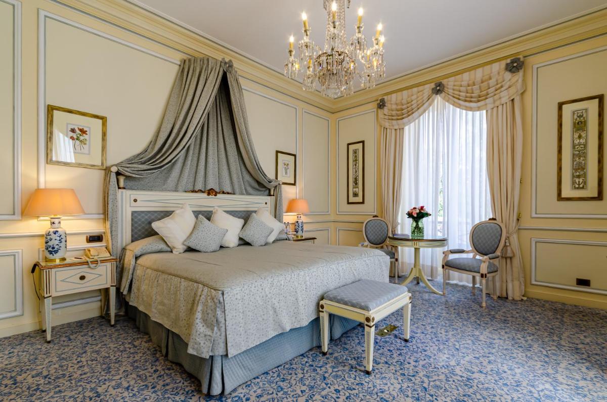 Uma cama ou camas num quarto em Olissippo Lapa Palace – The Leading Hotels of the World